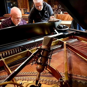 March 25, 2022, Brian and Pete Levin working out a part at Carriage House Recording Studio in Stamford, CT.