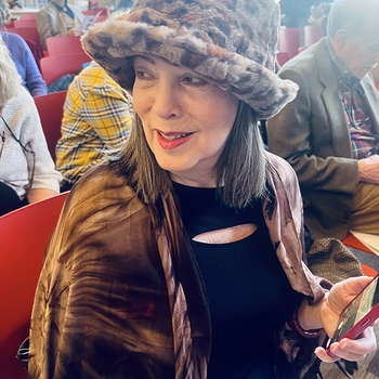  Bonnie Erickson getting an early seat at the Orchestra Lumos concert March 2024 at the Westport Library auditorium